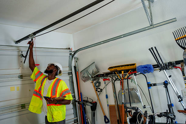 Professional Garage Door Panel Replacement technician working in Clearwater, KS